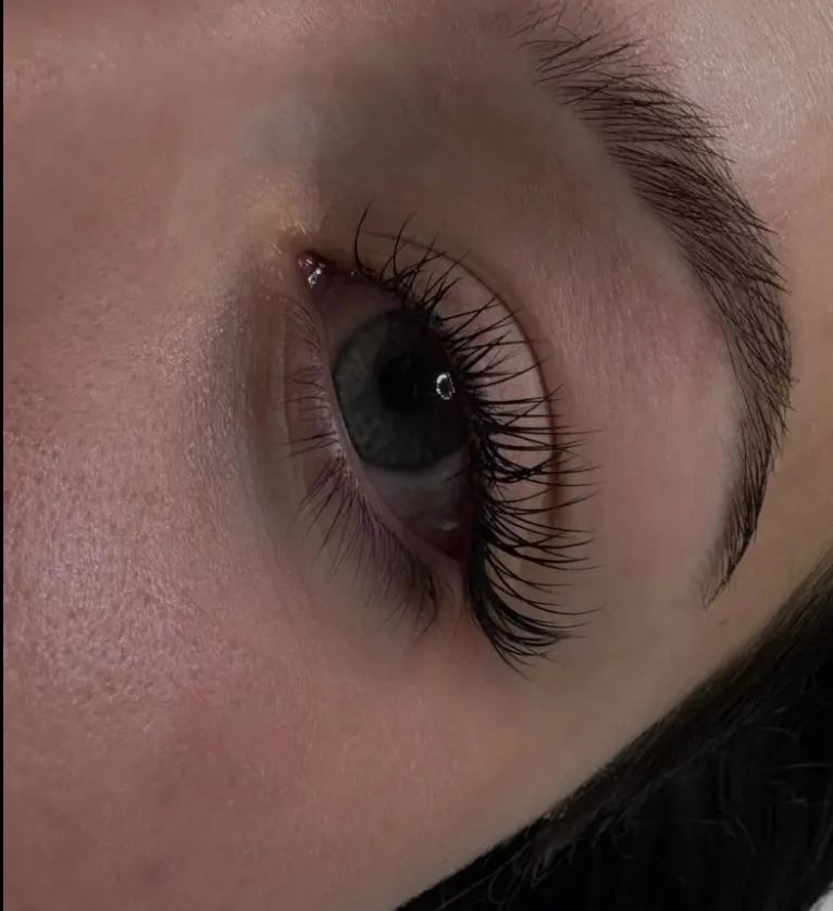 Long, full lash extensions from the side